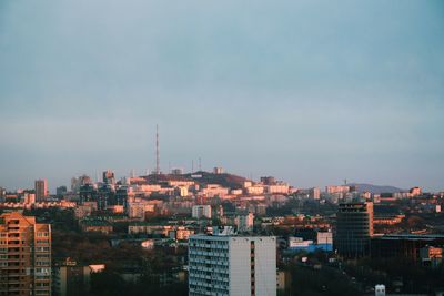 High angle view of buildings in city against sky