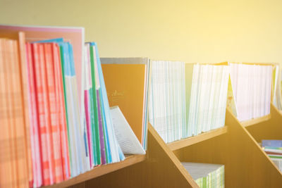 Close-up of books on shelves in library