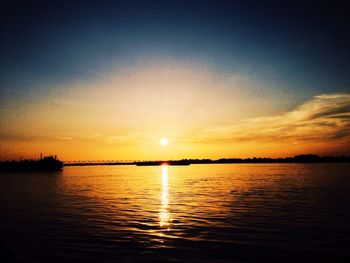 Scenic view of sunset over river