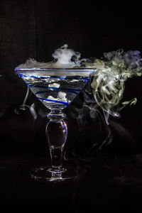 Jellyfish in water against black background