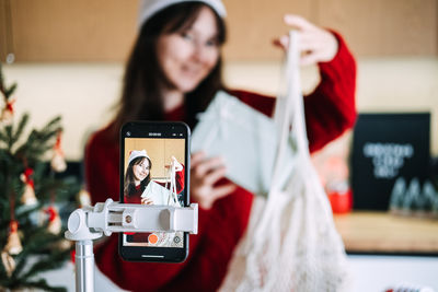 Young woman using mobile phone