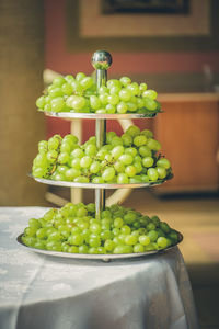 Green grapes on the table, rustic toned