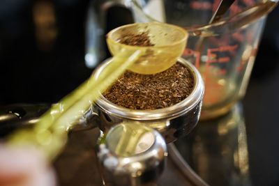 High angle view of coffee in glass jar on table