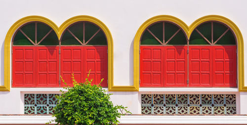 Red window on building