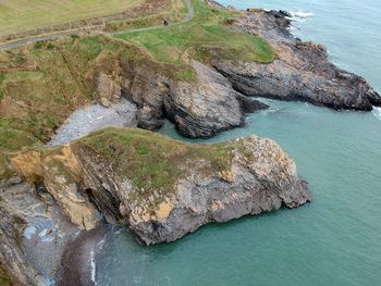 High angle view of rock formation in sea