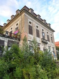 Low angle view of old building against sky