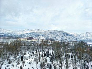 Scenic view of snowcapped mountains against sky