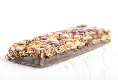 Close-up of chocolate cake against white background