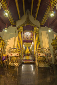 Low angle view of illuminated chandelier in building