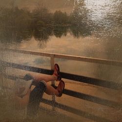 Reflection of woman in water