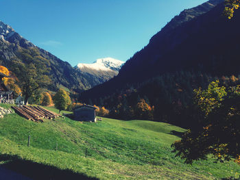 Scenic view of landscape and mountains against sky