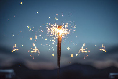 Firework display at night