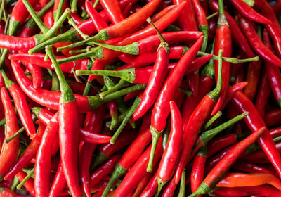 Full frame shot of red chili peppers for sale at market