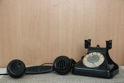 High angle view of telephone on table