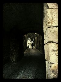 Man standing in tunnel