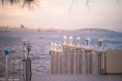 Light fixtures against sea