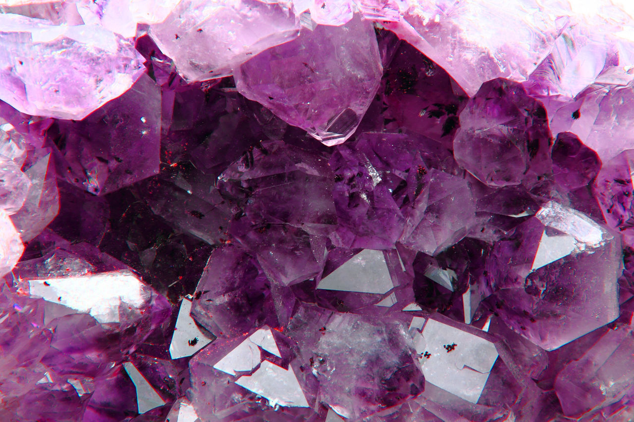 FULL FRAME SHOT OF ROCKS ON PINK BACKGROUND