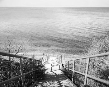 High angle view of sea shore against sky