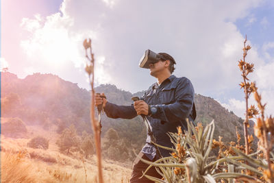 Hiker wearing virtual reality headset