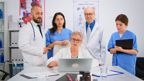 Portrait of female doctor working at clinic