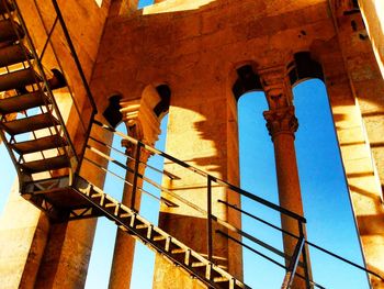 Low angle view of staircase against sky