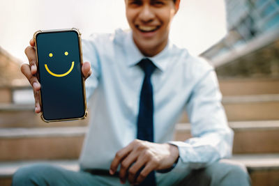 Young man using mobile phone