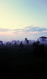 Scenic view of silhouette landscape against sky during sunset