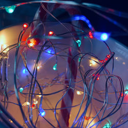 Close-up of illuminated lights at night