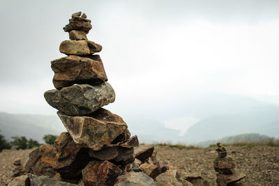 Stack of stones on landscape