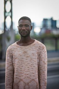 Portrait of young man standing outdoors