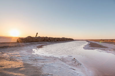 Sunrise at chott el djerid - salt lake in tunisia in sahara desert