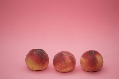 Close-up of fruits against white background