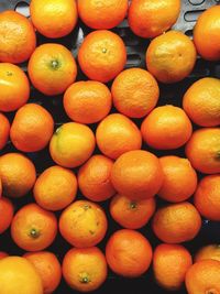 Full frame shot of oranges in market