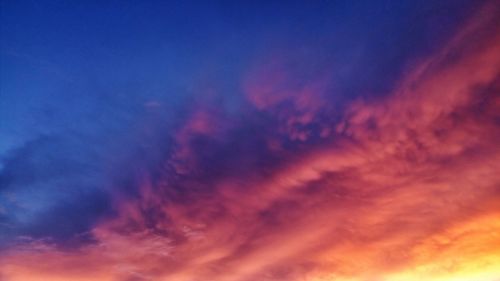 Low angle view of dramatic sky during sunset