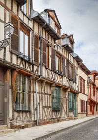 Low angle view of buildings against sky