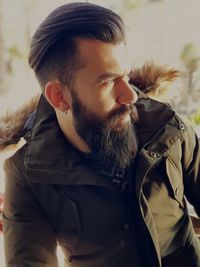 Portrait of young man looking away