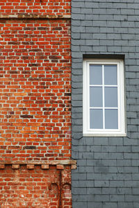 Window on brick facade, etretat-normandy