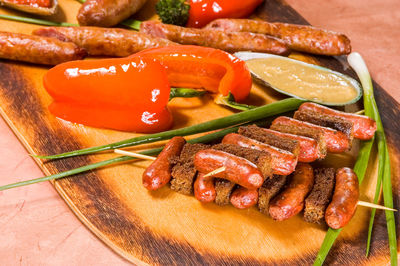 High angle view of meat on barbecue grill