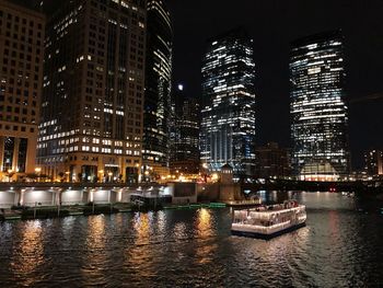 Illuminated buildings in city at night