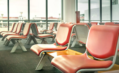Empty chairs at airport