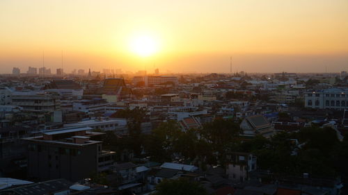 High angle view of townscape against sky during sunset