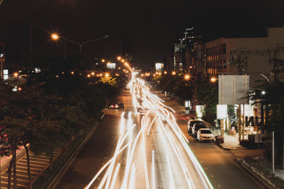 Light trails on city street at night