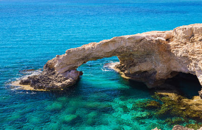 High angle view of rock formation in sea