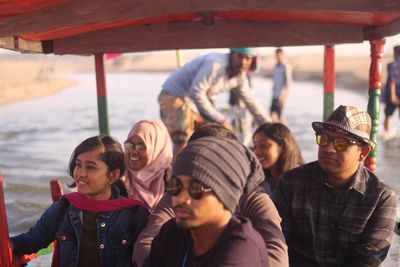 A candid of a group of people who were travelling by boat