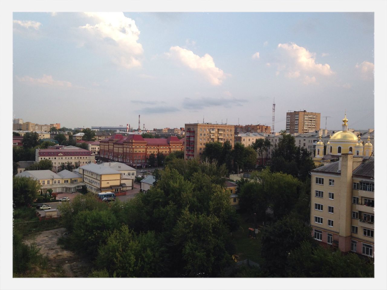 building exterior, architecture, built structure, transfer print, city, sky, tree, residential district, residential building, residential structure, auto post production filter, cityscape, cloud - sky, house, crowded, high angle view, cloud, city life, building, day