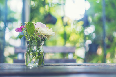 Close-up of flower vase on table