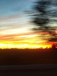 Scenic view of dramatic sky during sunset