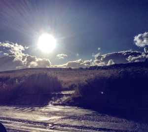 Scenic view of landscape against sky during winter