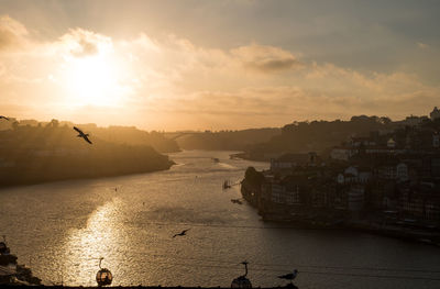 Scenic view of sea against sky during sunset