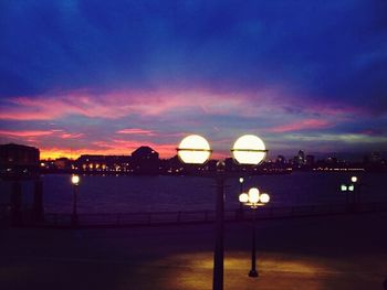 View of illuminated city at dusk